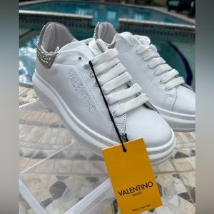 Authentic White Valentinos sneakers size 8. Brand new with tags, never used.